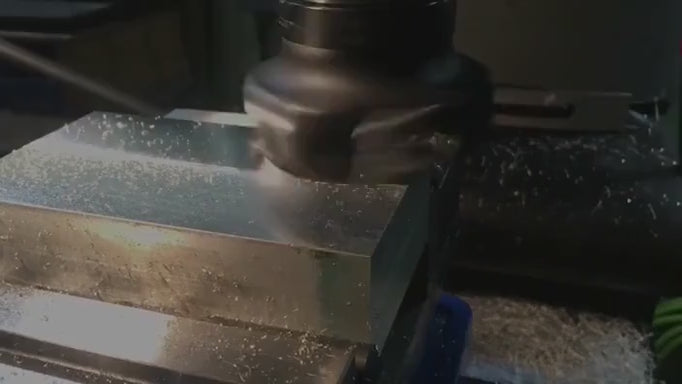 My 1972 Bridgeport 1HP VS Series 1 surface milling a block of aluminum that into a fixture plate
